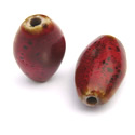 Thumbnail of CERSeed-Rust - Handmade seed shaped ceramic bead - rusty red color