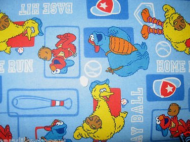 Image 0 of Sesame Street Big Bird Ernie Cookie monster baseball blue flannel by the yard 