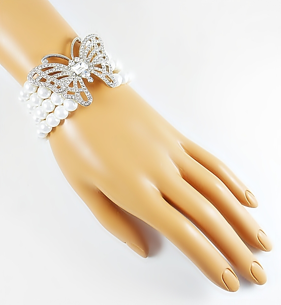 Rhinestone and silver butterfly on 4 line pearl stretch bracelet