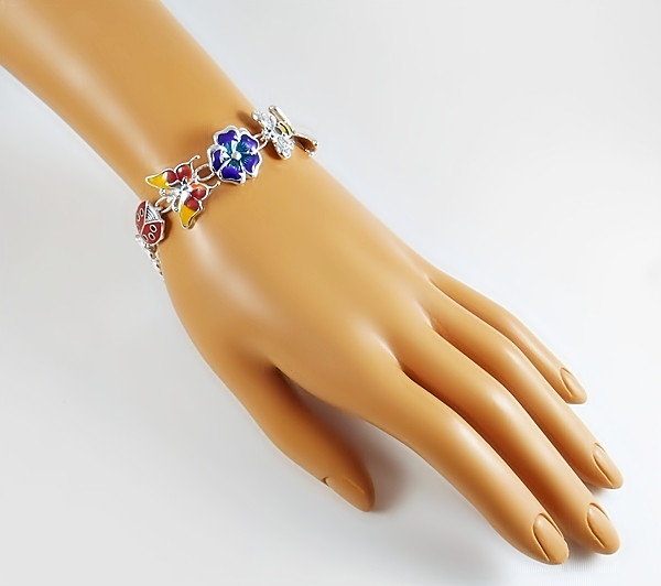 Flower garden link bracelet with butterfly, daisy, ladybug, bumble bee and other colorful Spring links with magnetic closure