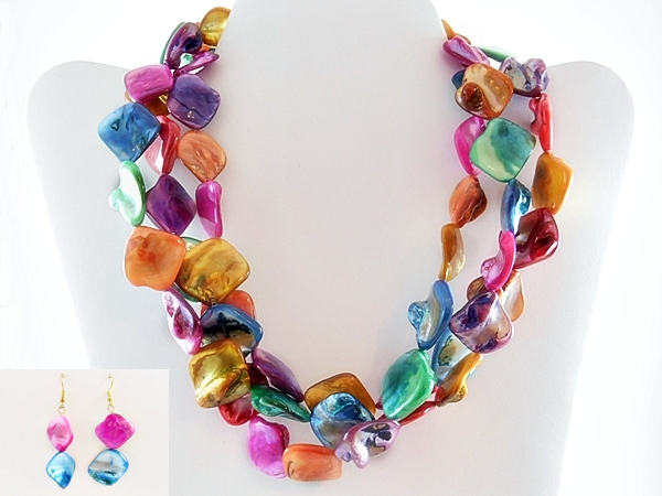 Three strands of vibrant rainbow multi color shells make up this unique necklace. The matching hook dangle earrings are made of the same pink and blue shells.
