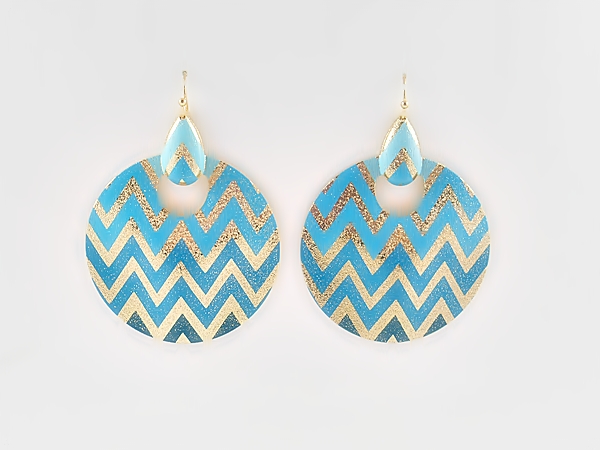 Round metal turquoise and gold glitter chevron dangle earrings.