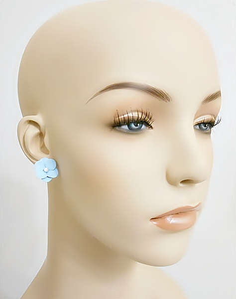 Feminine and detailed sky blue epoxy metal flower post earrings with tiny white center.