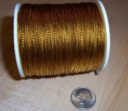 Thumbnail of Gold Metallic Cord, about 1mm diameter, sold by the yard