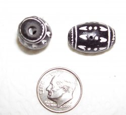 Thumbnail of Black & White Oval about 20mm, photo shows top and side views