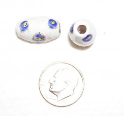Thumbnail of Raku fired--Pale blue background, blue dots, yellow centers