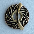 Thumbnail of SakiBrTog125 - Saki bronze rnd. spiral ray toggle w/banana bar - Thailand