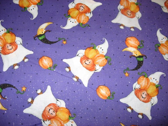 Halloween Ghosts carrying pumpkins on glittery Purple Cotton fabric by the yard