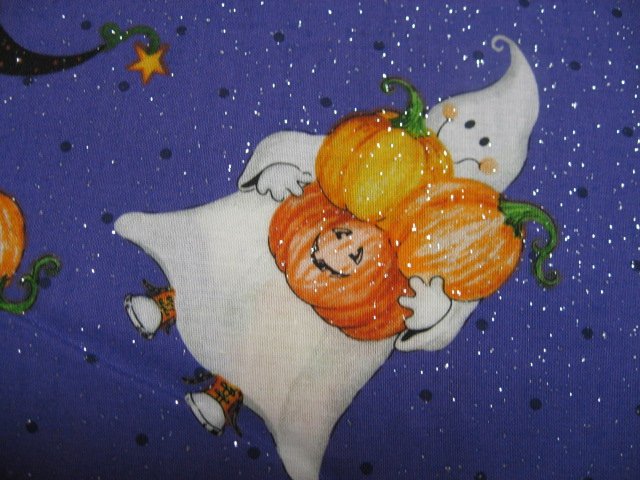 Image 1 of Halloween Ghosts carrying pumpkins on glittery Purple Cotton fabric by the yard