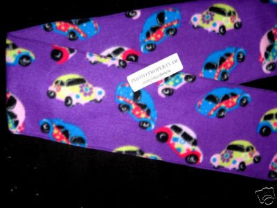 Image 0 of VW Beetle cars and peace flowers on a purple retro look fleece scarf