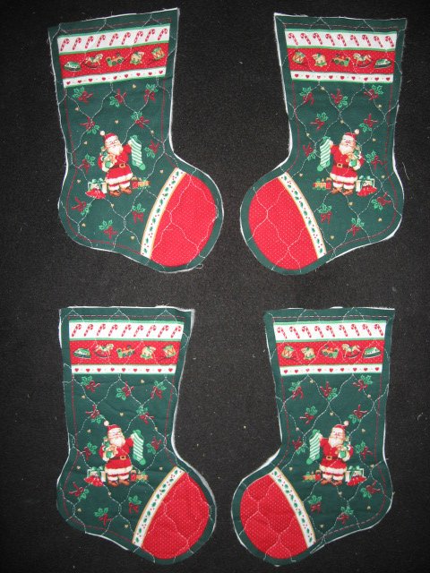 Santa and presents 4 pieces Prequilted fabric Christmas stockings to sew teacher