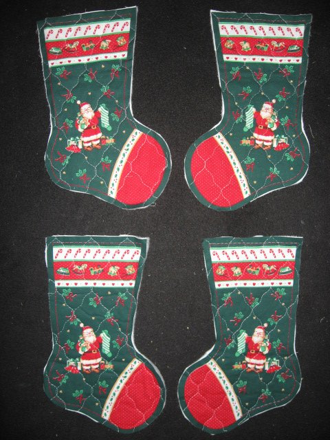 Image 0 of Santa and presents 4 pieces Prequilted fabric Christmas stockings to sew teacher