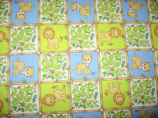 Lion  Precious Moments blue and green squares fabric by the yard