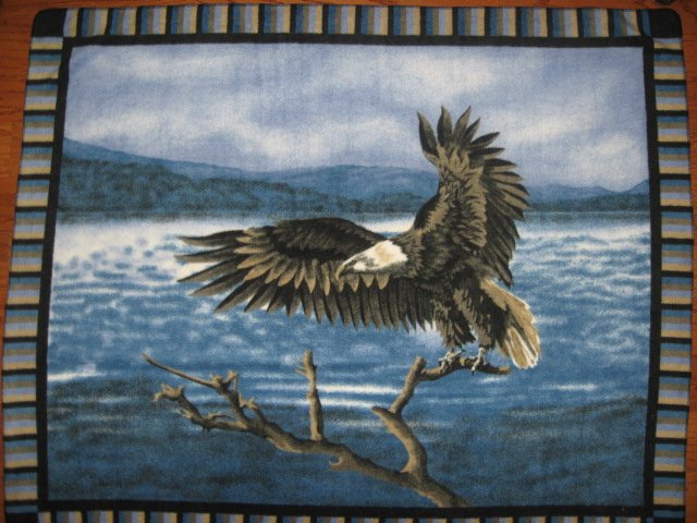 Image 0 of Eagle landing in tree Fleece Blanket 