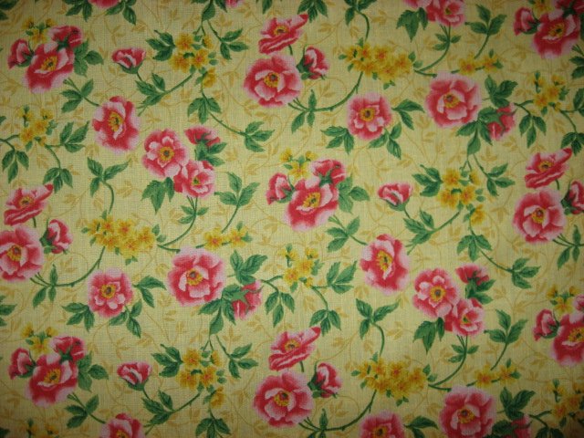 Flowers on pretty yellow cotton fabric