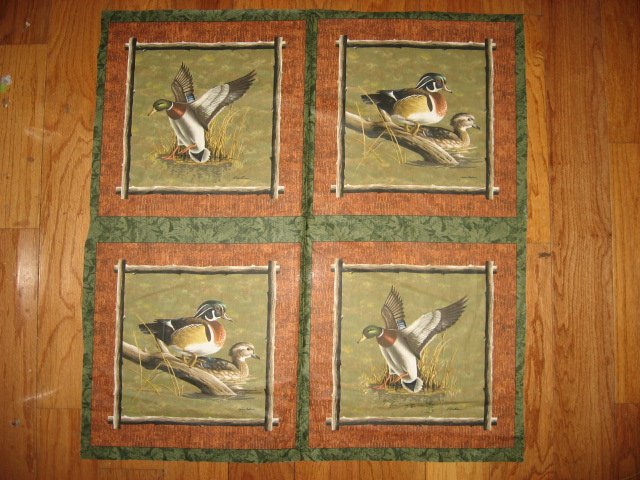 Image 0 of Hautman wood duck on a log in a lake Fabric 4 Pillow Panel set to sew