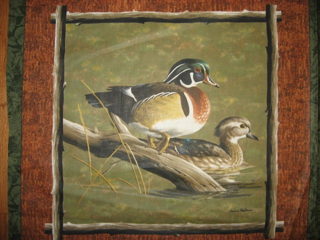 Image 1 of Hautman wood duck on a log in a lake Fabric 4 Pillow Panel set to sew