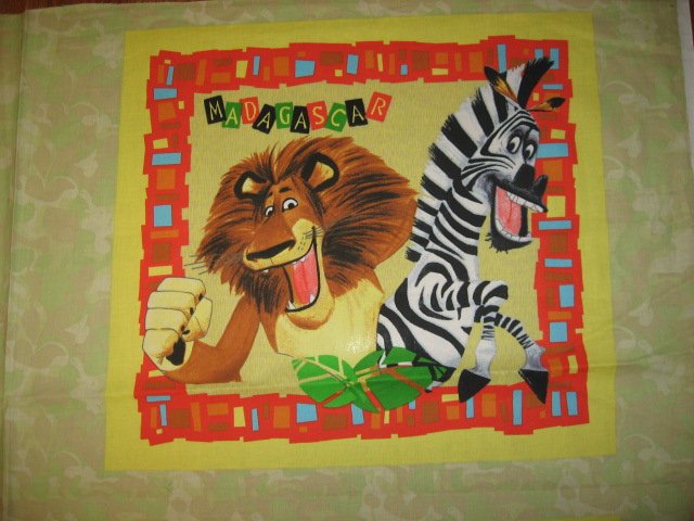 Image 1 of Madagascar Lion zebra giraffe hippo fabric pillow panel Set of two to sew