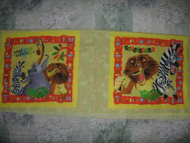 Madagascar Lion zebra giraffe hippo fabric pillow panel Set of two to sew