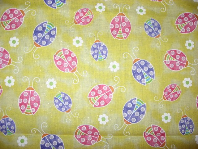 Image 0 of Multicolored Ladybugs on Yellow Glittered cotton Fabric by the yard