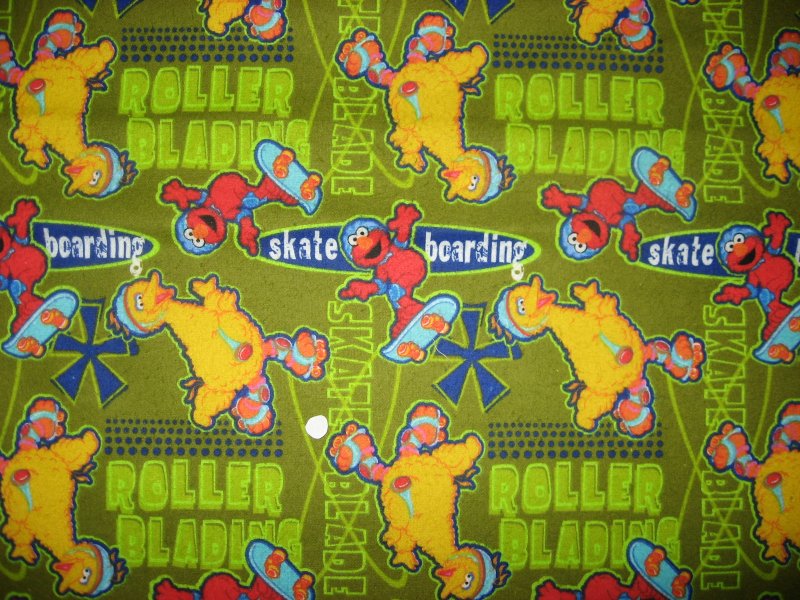 Sesame Street Big Bird and Elmo Skateboard and Rollerblade flannel Cotton fabric