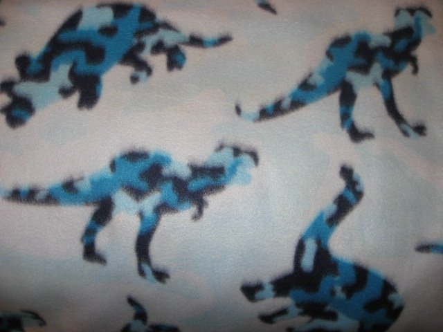 Whimsical  Dinosaurs very soft handmade toddler size blue fleece blanket 29X45