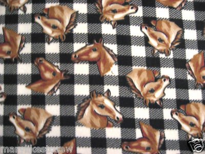 Image 0 of Horse Heads black and white plaid fleece blanket 
