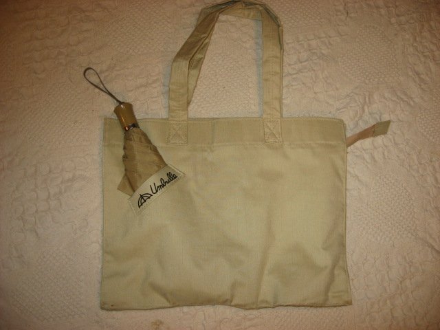 Ladies Soft tan canvas cloth bag carrying case and umbrella /
