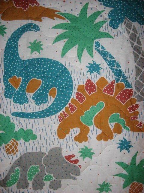 Image 1 of Whimsical dinosaurs crib quilt fabric panel finished edges