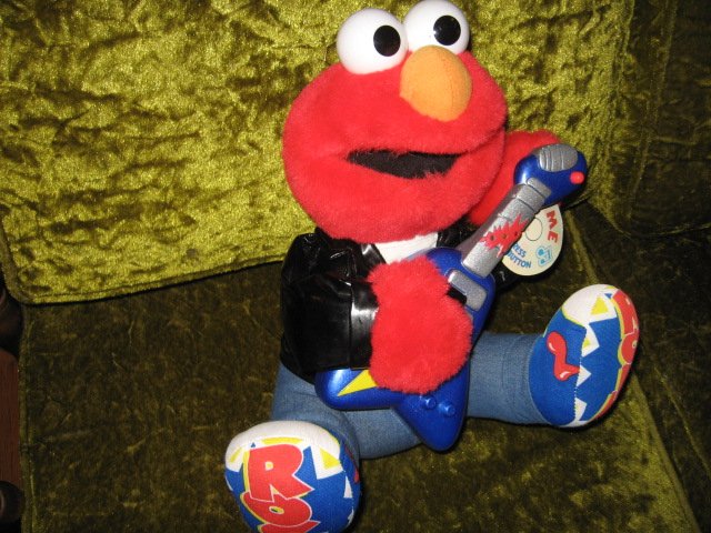 Image 2 of Elmo 1998 Rock and Roll plays guitar music vibrates