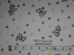 Thumbnail of Dalnatian Dog Puppy Paw prints on white flannel By the Yard