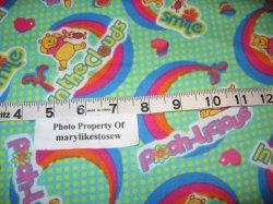 Thumbnail of Winnie the Pooh Rainbow Hearts Licensed Flannel By the Yard Green Cotton Fabric 
