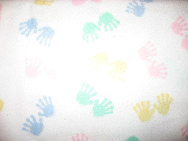 Image 0 of Baby Handprints Pastel white 100% cotton flannel By the Yard