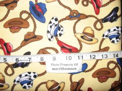 Thumbnail of Cowboy hats and ropes on yellow flannel By the yard