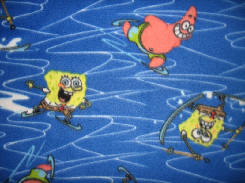 Image 0 of SpongeBob and Patrick ice skating fleece toddler blanket