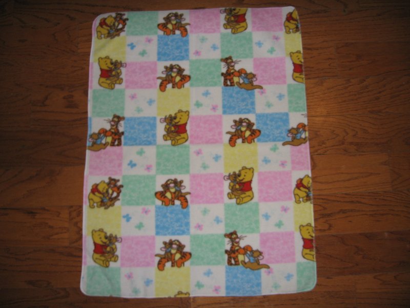 Image 1 of Winnie The Pooh and Tigger pastel squares fleece blanket