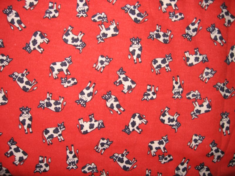 Image 0 of cow farm animal on red flannel by the yard