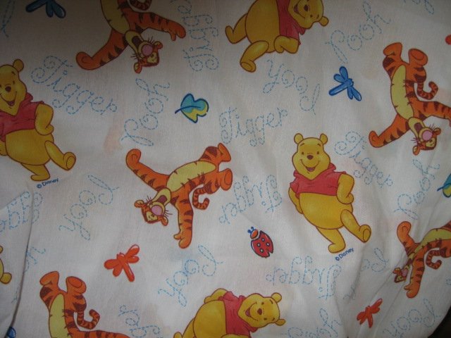 Image 0 of Winnie the Pooh fitted bed and top sheet looks like brand new fabric  56 X 84 in