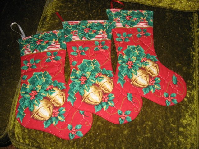Holly bells Quilted Christmas stockings Twelve inch set of three with hanger