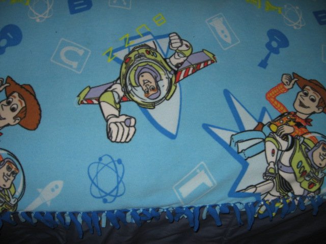 Image 1 of toy story double sided Fleece Blanket tied edges 42 inch by 52 inch