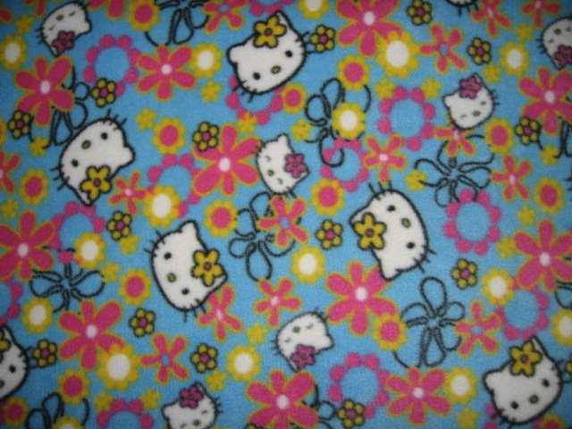 Hello Kitty faces flowers fleece blanket