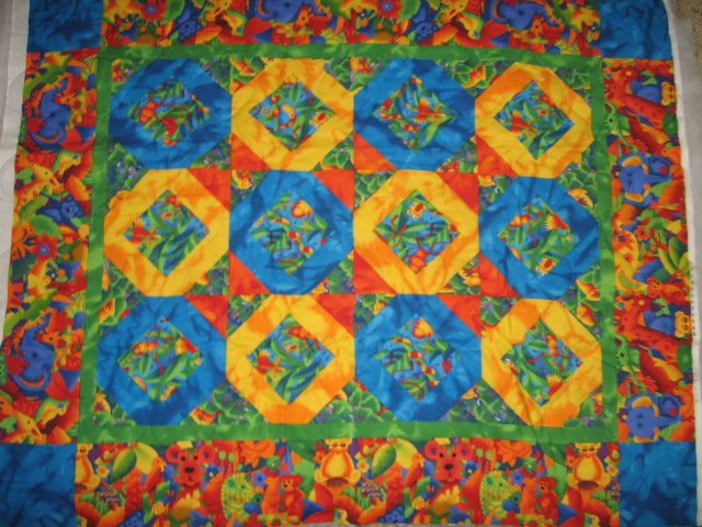 Image 0 of Jungle collage  baby animals matching border quilt 42 X 35 inch