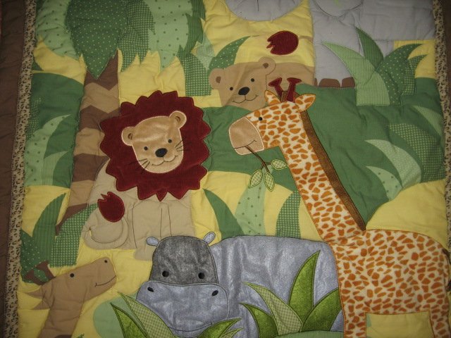 Image 1 of Giraffe Monkey Lion Elephant Hippo crib quilt with backing fabric
