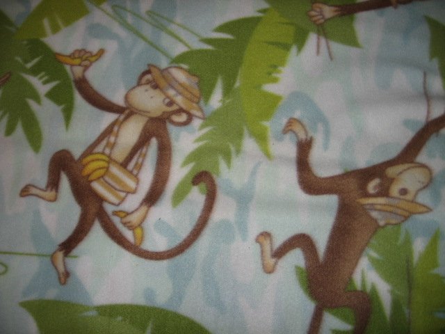 Image 1 of Monkeys playing in trees child bedside fleece blanket 29 inch by 59 inch long