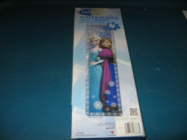 Image 1 of Frozen Anna Elsa Tower 50 piece puzzle 5 inch by 19 inch Disney