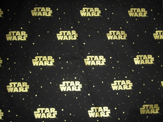 Image 0 of Star Wars Gold Letters gold stars black background overall Fabric  by the yard 