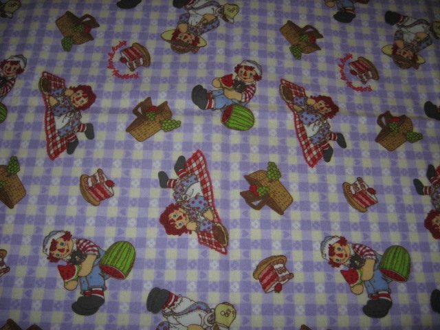 Image 0 of Raggedy Ann Andy Lilac Child Flannel Fabric Blanket 30 inch by 44 inches