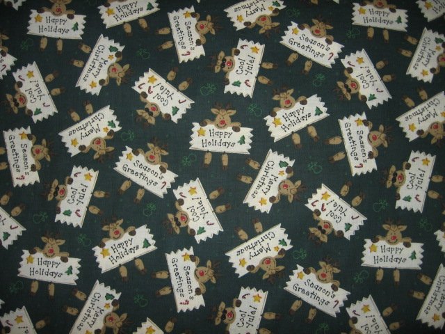 Image 0 of Reindeer Greetings Christmas dark green cotton fabric by the yard