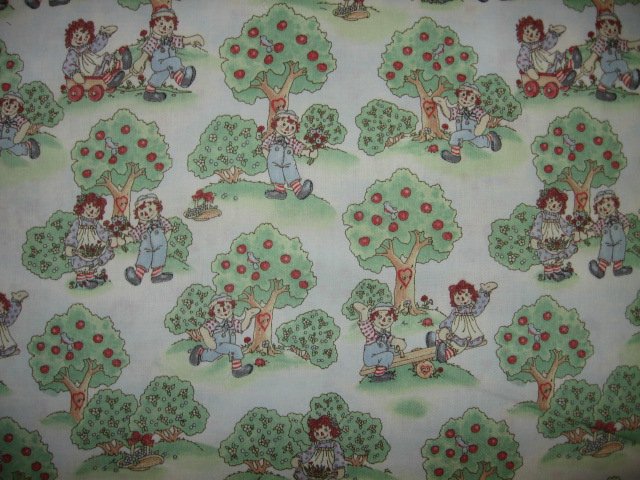 Image 0 of Raggedy Ann and Andy green trees cotton fabric by the yard