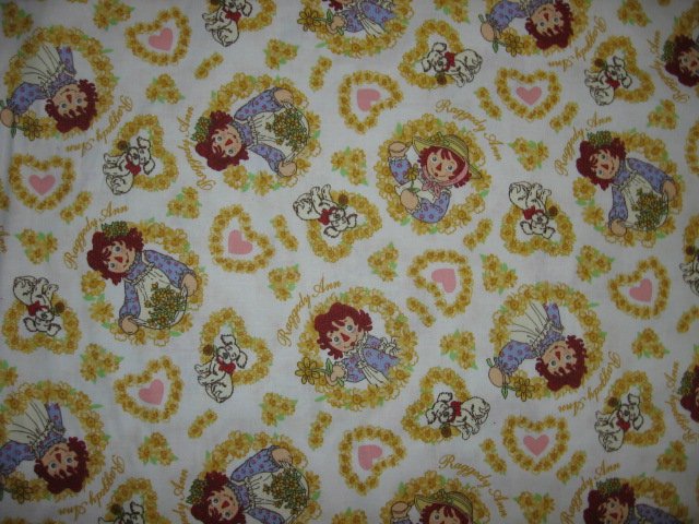 Image 0 of hearts flowers yellow  Raggedy Ann cotton fabric by the yard